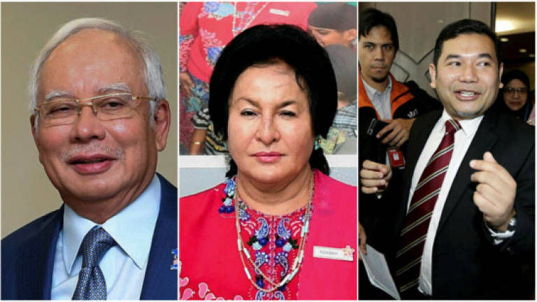 Najib, Rosmah withdraw suit against Rafizi, publisher
