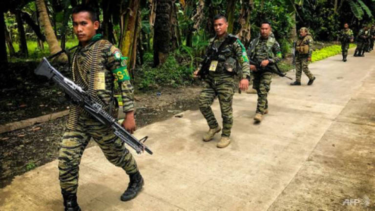 Philippines' biggest Muslim rebel group sounds IS alarm