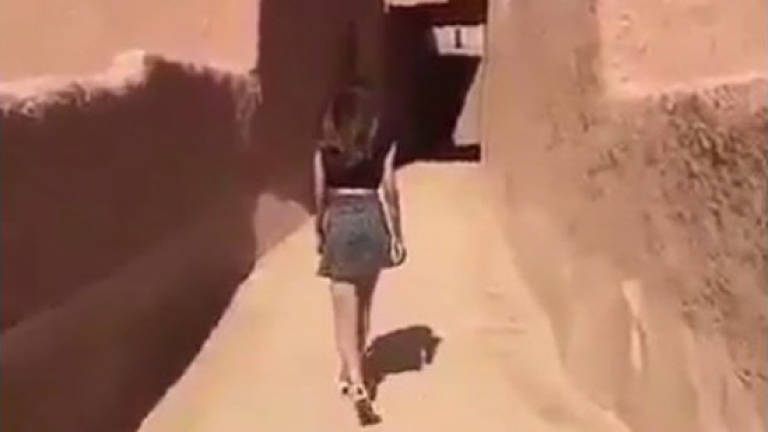 Saudi police question woman who wore miniskirt in video