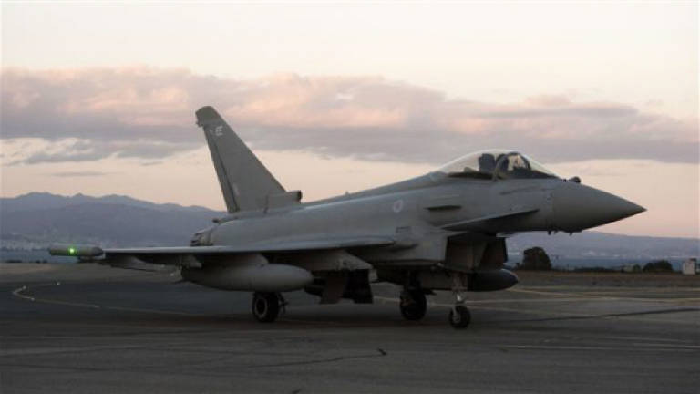 Qatar agrees to buy 24 jet fighters from the UK