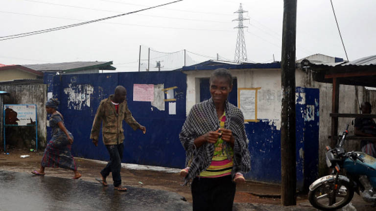 Infected Ebola patients flee after attack on Liberia clinic