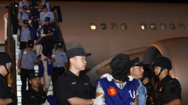 Taiwan to punish fraudsters abroad after China deportations