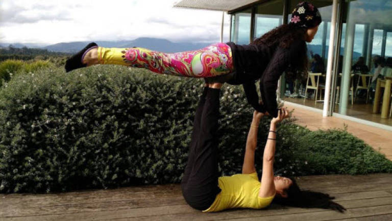 Yoga in acrobatic motion