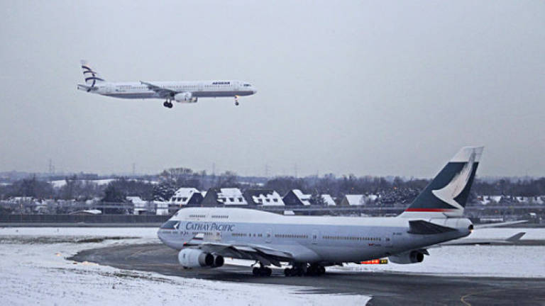 New icy blast cancels over 100 flights at London Heathrow