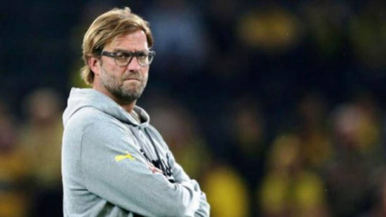 Klopp says owners want solution to Liverpool ticket row