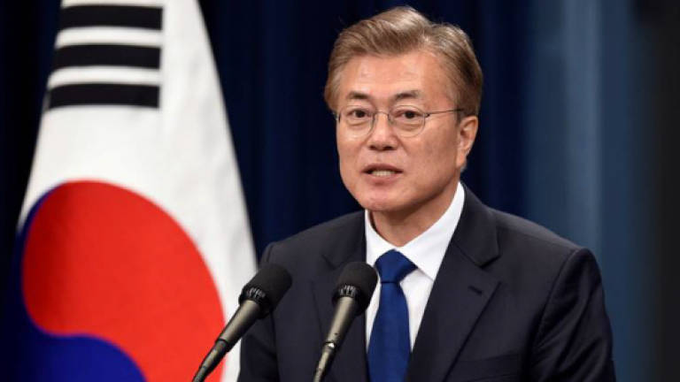 S. Korea's Moon to send special envoys to North on Monday