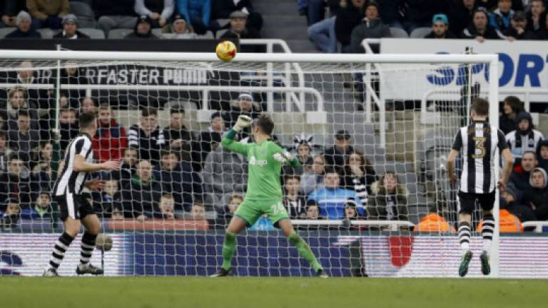 Late Clark own goal keeps Newcastle off top