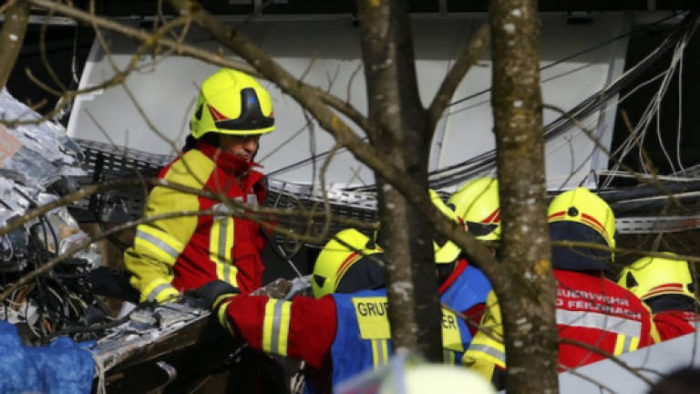 Four dead, 150 hurt in train crash in Bavaria
