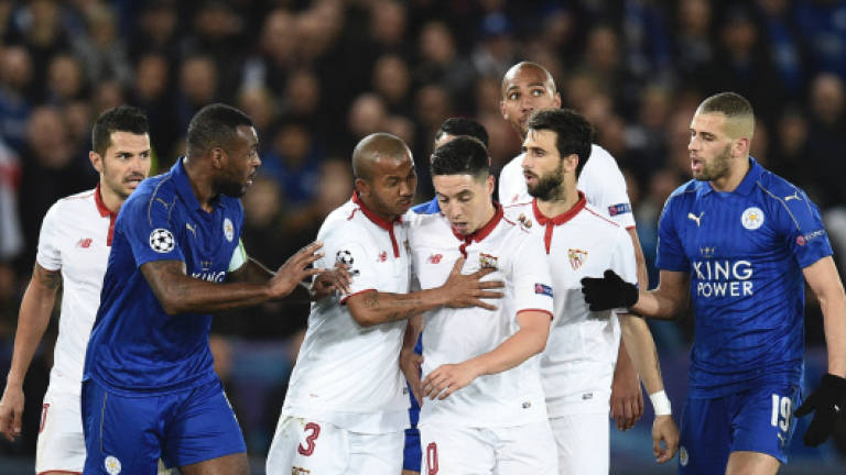 Schmeichel thwarts Sevilla as Leicester rekindle fairytale