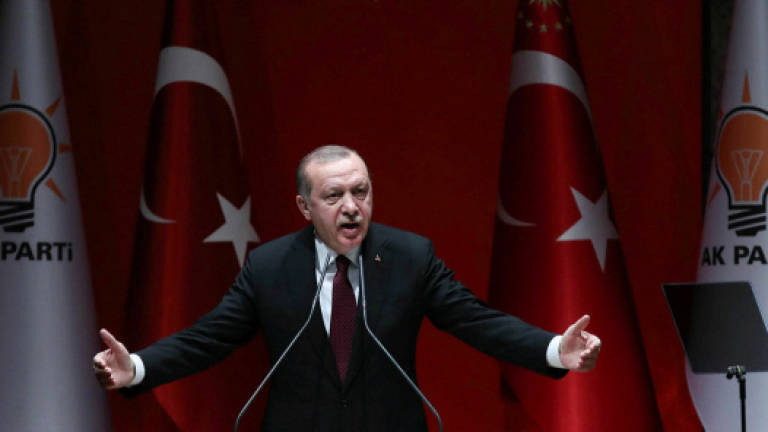 Erdogan threatens to expand offensive to other northern Syrian cities
