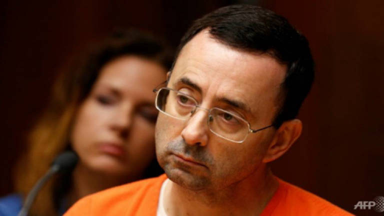 US Olympic gymnastics doctor pleads guilty to child porn charges