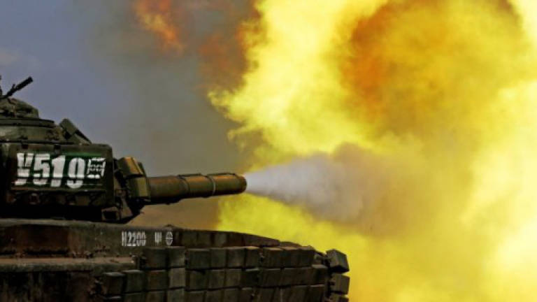 France warns of 'intimidating' Russian war games