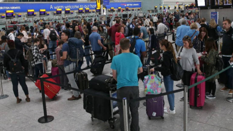 BA flights disrupted for third day after IT crash