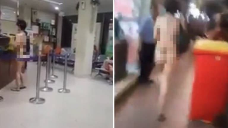 (Video) Cops nab naked woman shopper