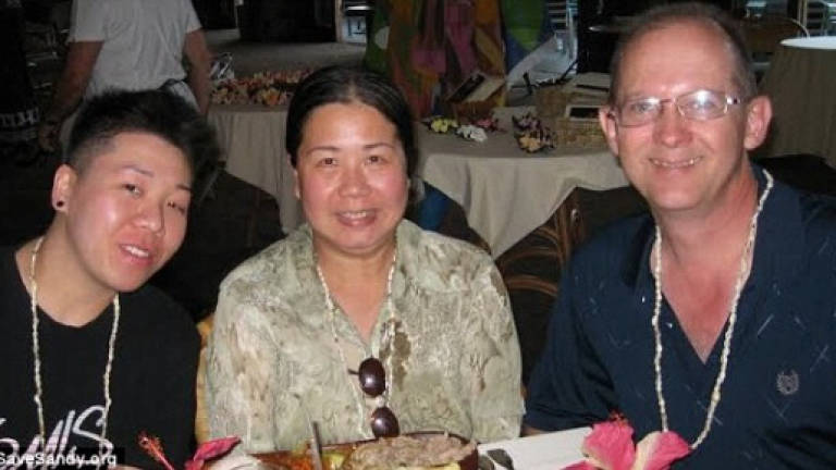 China must free US woman held for 'spying': Rights group