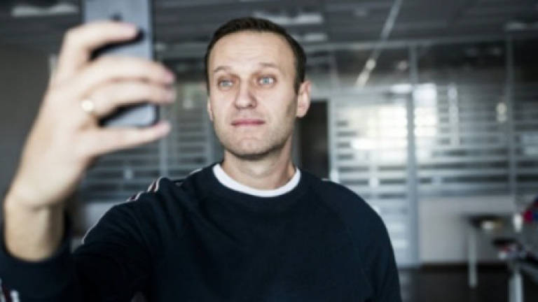 Navalny fights to run against Putin in Russia election