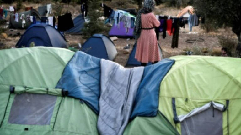 Refugees in 'deadlock' on Greek islands as arrivals surge