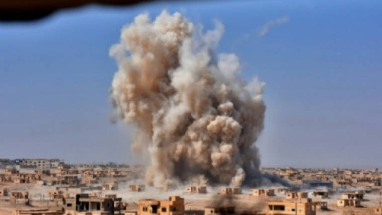 Russian, US-led strikes kill 39 in Syria's Deir Ezzor: monitor