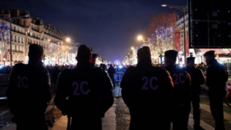 New Year car torching, arrests up in France