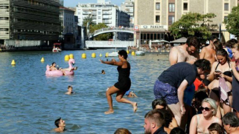 Pioneering Paris canal swimming spot closed due to pollution