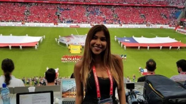 Russian who groped female World Cup reporter apologises
