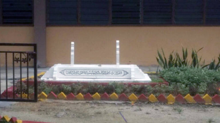 Ministry orders school to move replica tombstone