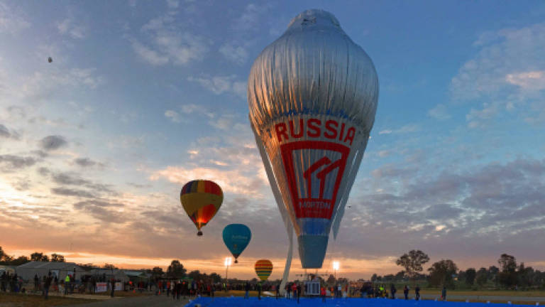 Russian breaks round-the-world hot air balloon record