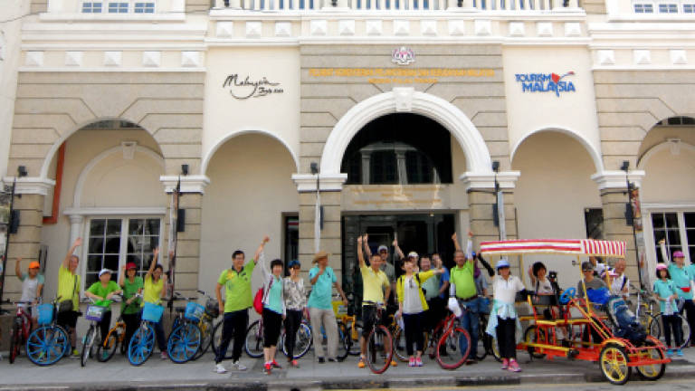 Tourists from Japan, Singapore, China participate in George Town Heritage Cycling
