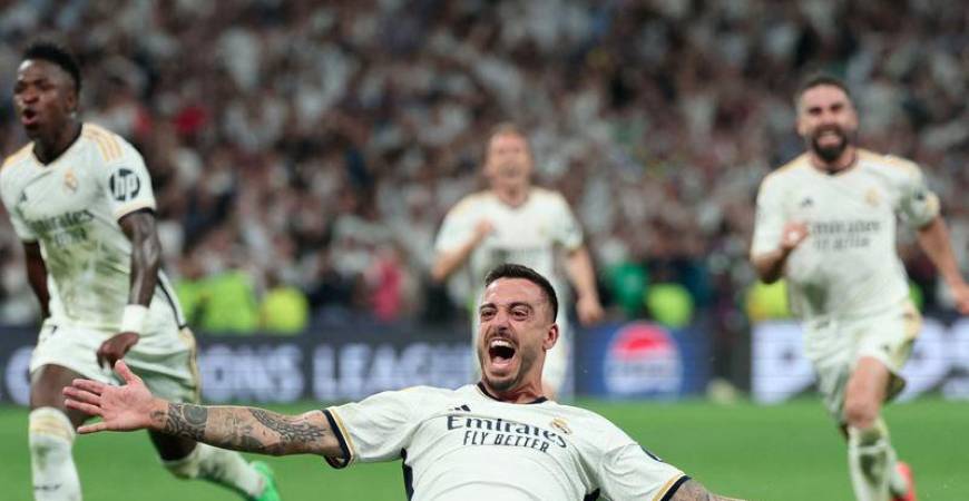 Real Madrid's Spanish forward #14 Joselu celebrates scoring during the UEFA Champions League semi final second leg football match between Real Madrid CF and FC Bayern Munich at the Santiago Bernabeu stadium in Madrid on May 8, 2024. - AFPPIX