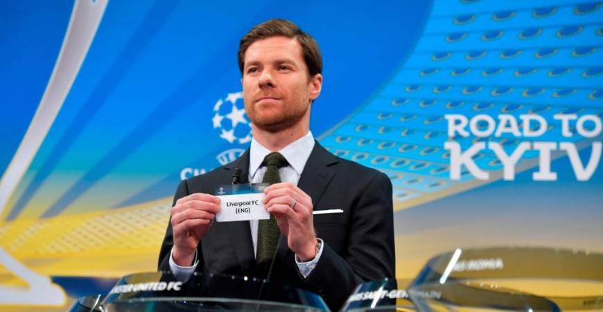 Filepix: Spanish former international Xabi Alonso shows the slip of Liverpool FC during the draw for the round of 16 of the UEFA Champions League football tournament at the UEFA headquarters in Nyon on December 11, 2017/AFPPix