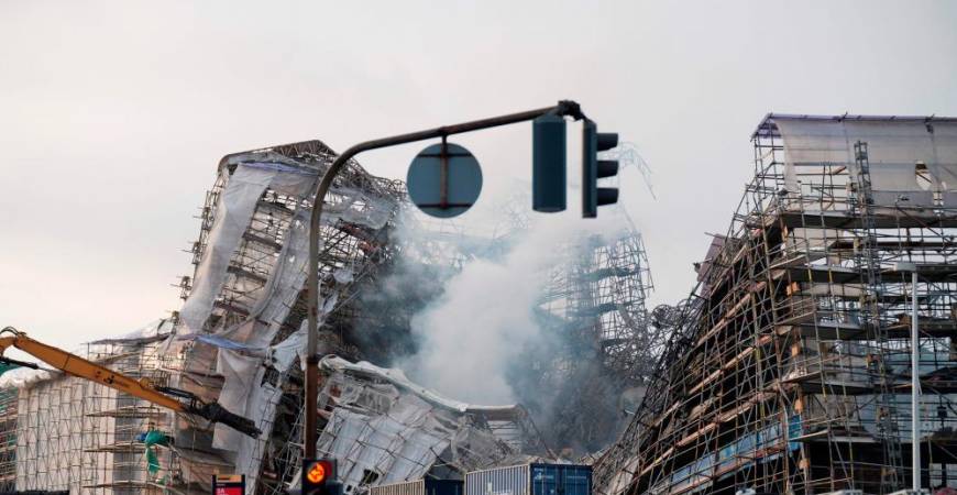 A photo shows the ruins after the outer wall has collapsed in a fire in the historical Boersen building, the former Stock Exchange in Copenhagen, on April 19, 2024/AFPPix