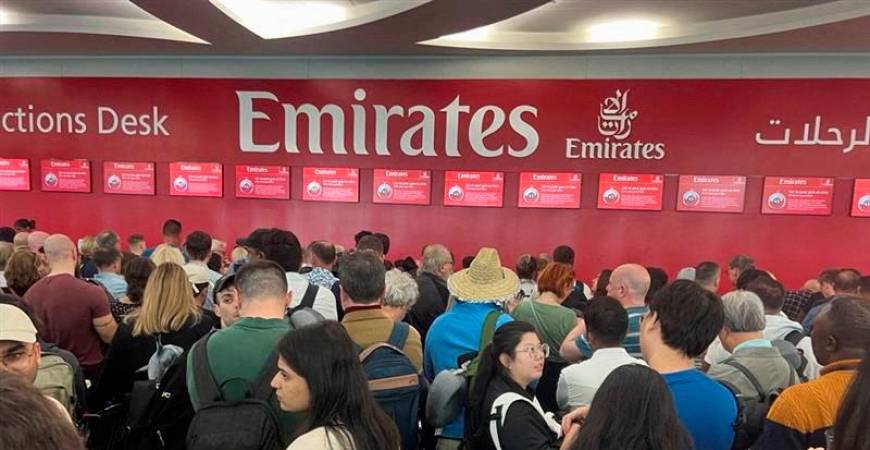 People queue at a flight connection desk after a rainstorm hit Dubai, causing delays at the Dubai International Airport, United Arab Emirates, April 17, 2024/REUTERSPix