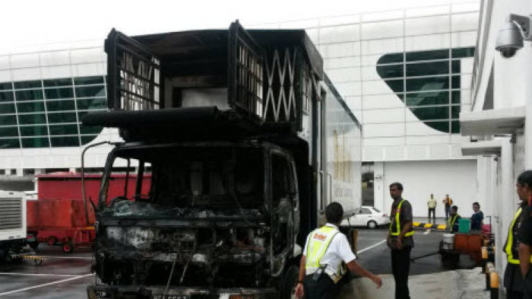 Food catering truck catches fire near AirAsia plane