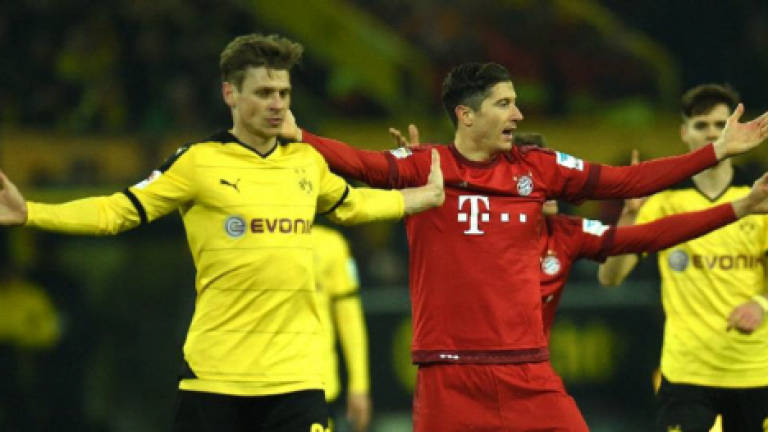 Bayern feel Dortmund's pressure in title race