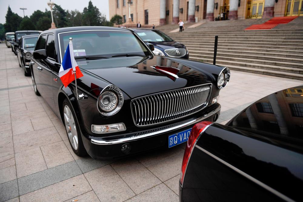 This file photo taken on June 25 shows a Red Flag limousine used by French Prime Minister Edouard Philippe parked outside the Great Hall of the People in Beijing.