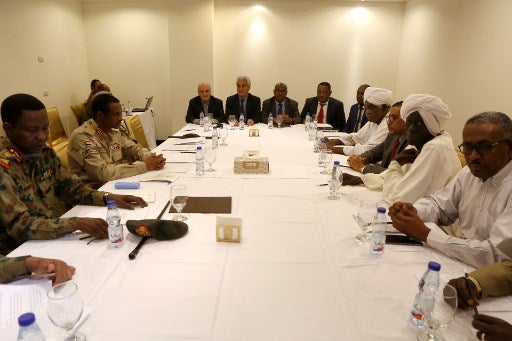 Members of the Sudanese Military Council and the protest movement the Alliance for Freedom and Change meet at the Corinthia Hotel in the capital Khartoum on July 3, 2019. — AFP