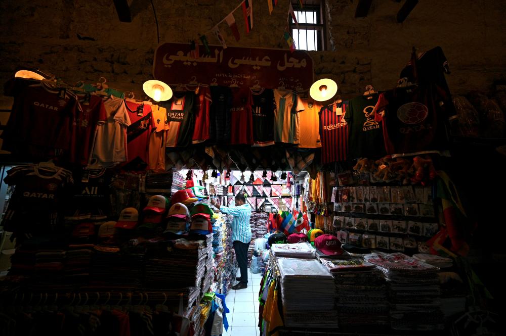 $!A man arranges his shop at Souk Waqif in Doha. – AFPPIX