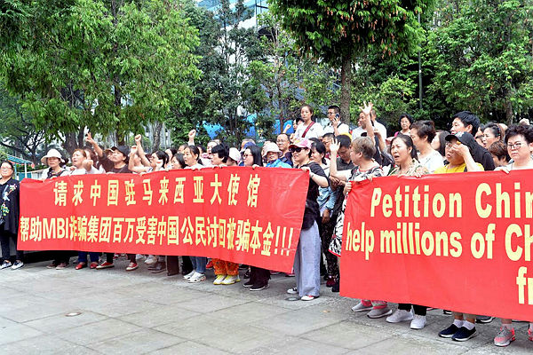 China citizens protest infront of the Chinese Embassy in Kuala Lumpur.