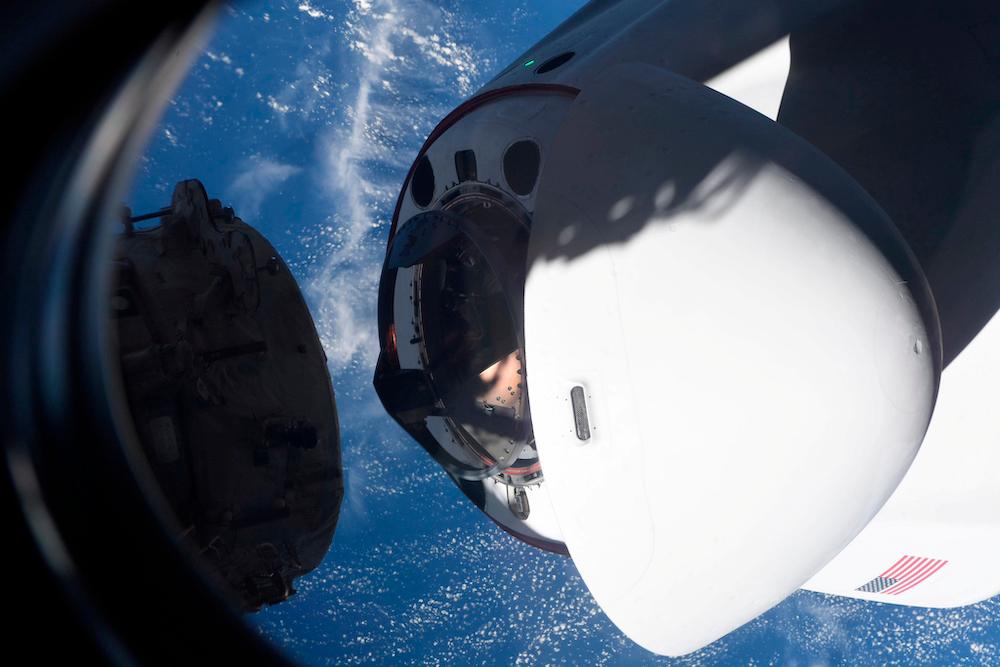 The SpaceX Crew Dragon capsule Endeavor, carrying four astronauts, approaches the International Space Station orbiting the Earth April 24, 2021. Picture taken April 24, 2021. Mike Hopkins/NASA/Handout via Reuters. REUTERSPix