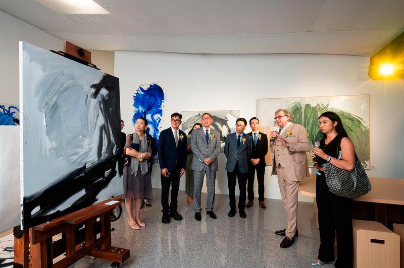 $!Curator of the exhibition and artist Bruno Moinard walked guests of honor through a personal tour of his eponymous exhibition at GalaxyArt.