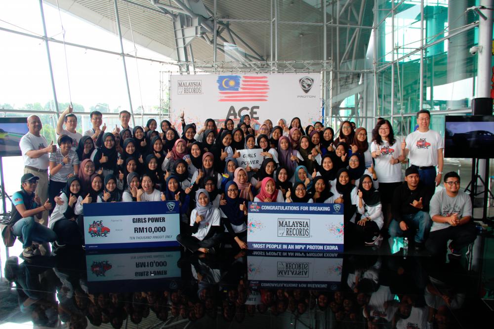 $!Milestone #5: Also in August, Proton created a new entry in the Malaysia Book of Records for most people in an MPV when 55 people squeezed into a Proton Exora during the “Ace the Space Challenge”.