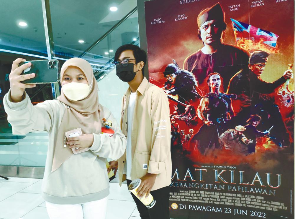 Nurul Fitratul Rahimi and Azlihisham Mustafa were among many who thronged cinemas to watch Mat Kilau. Ranjit said it was important to avoid sending wrong messages to the public. – HAFIZ SOHAIMI/THESUN