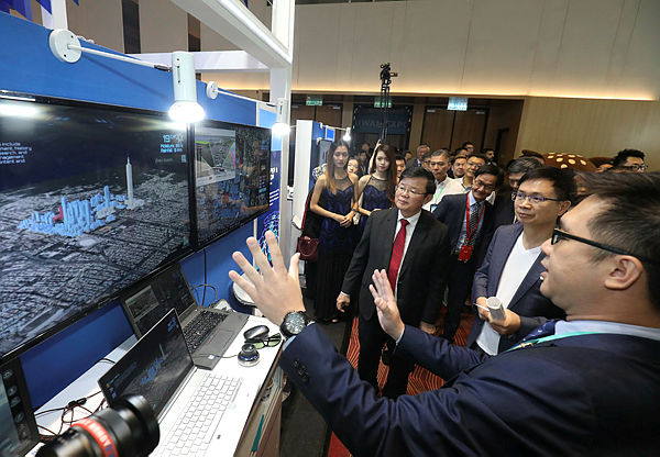 Penang Chief Minister Chow Kon Yeow and Taitra chairman James C.F. Huang visit a booth at the Taiwan Expo 2019 at the Setia SPICE Convention Centre, George Town. — Sunpix by Masry Che Ani