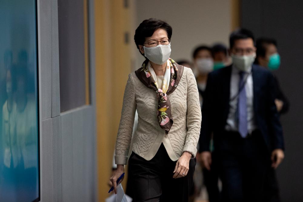 Hong Kong’s Lam tells solicitors’ group to stay out of politics