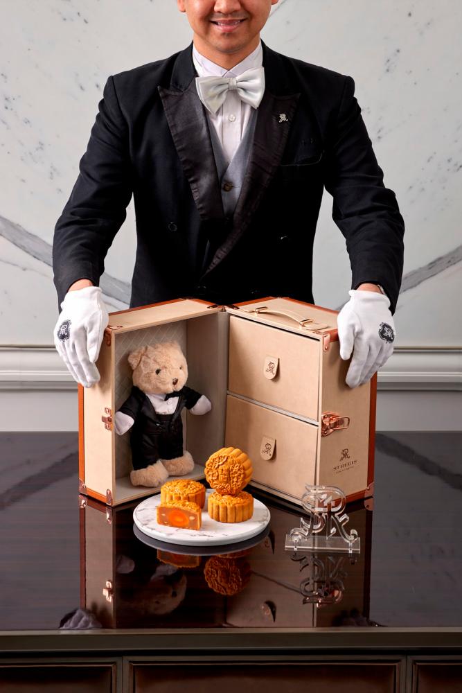 $!The Butler Bear complements the St Regis butler tradition with the Classic Mooncake Trunk.