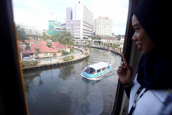 Filepix shows a view of the Malacca River from inside the Malacca Monorail.