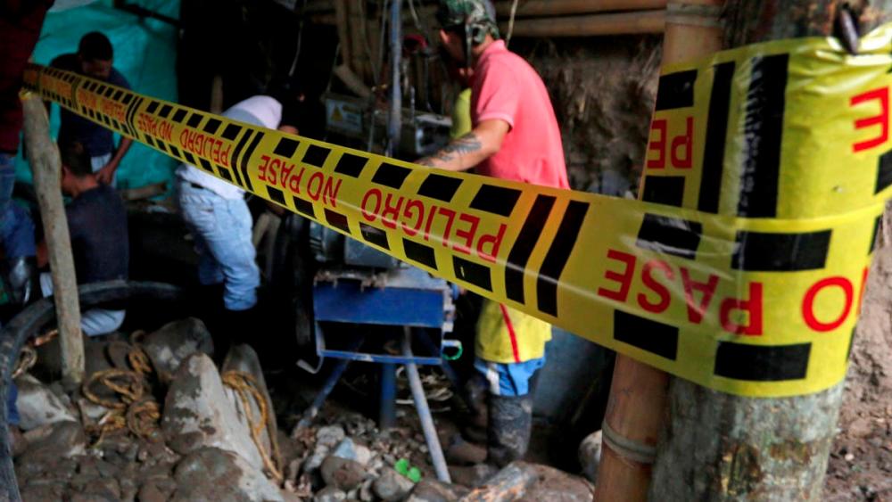 Rescuers recover bodies of 11 killed in illegal Colombian mine