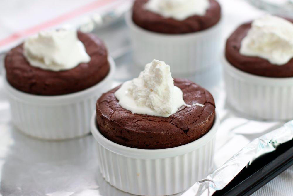 Chocolate souffle with whipped cream. – ANNA VOCINO