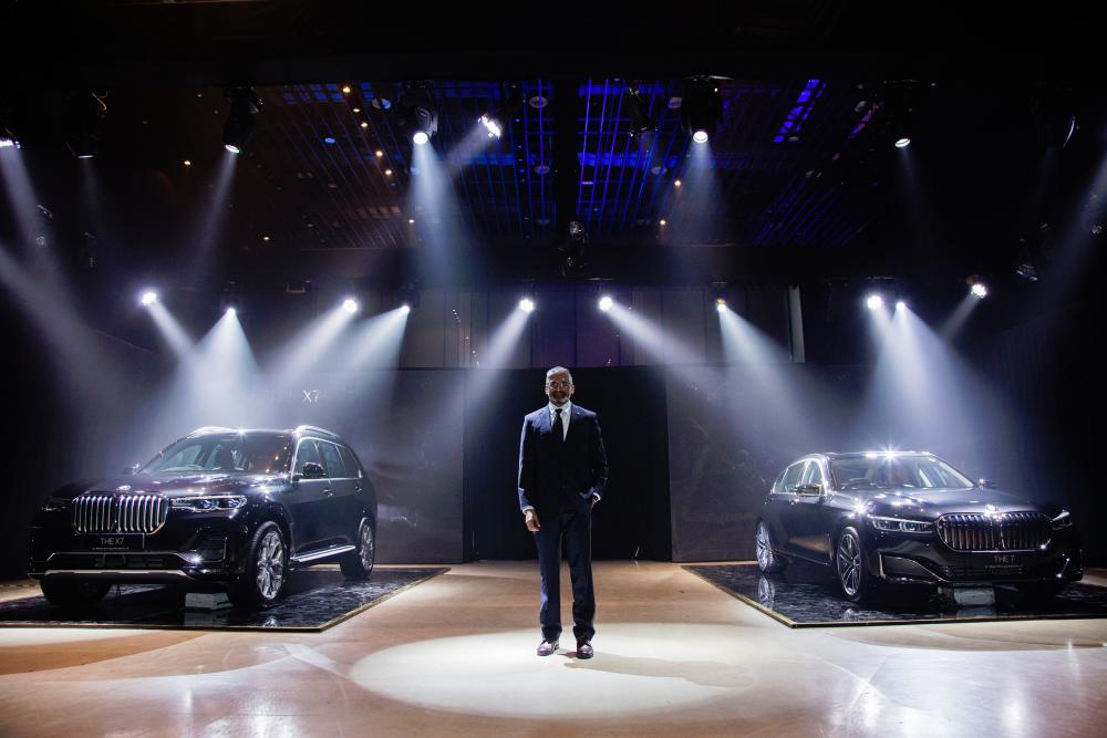 BMW Group Malaysia head of corporate communications Sashi Ambi presenting the first-ever X7 (left) and the new 7 Series in Kuala Lumpur.