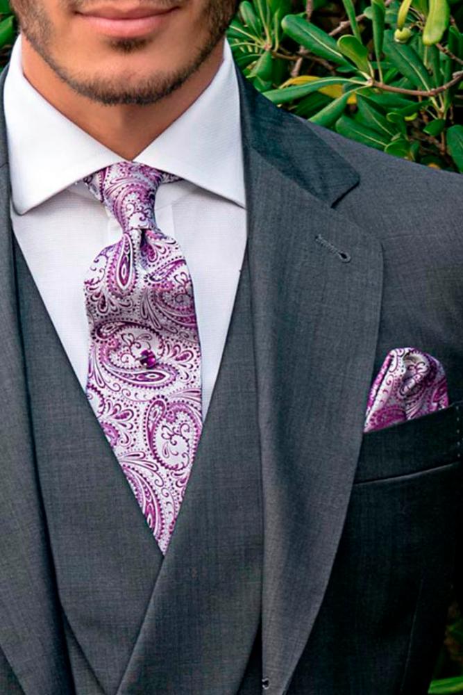 A well-tailored suit exudes sophistication. – OTTAVIO